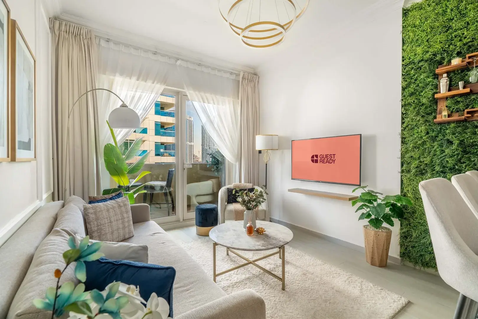 A light living room with a view to Dubai city