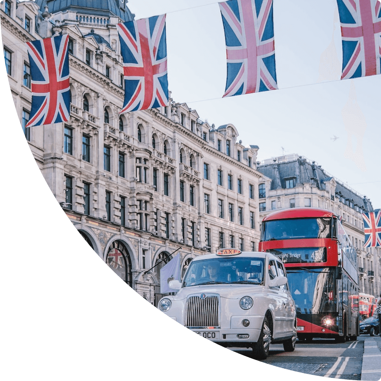 a double decker bus and a car on a street