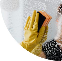 a person cleaning a window
