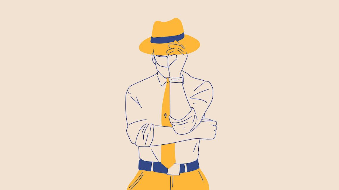 Une personne avec des accessoires et des lunettes jaunes, touchant le bord de son chapeau, sur un fond beige clair - comment fonctionne airbnb