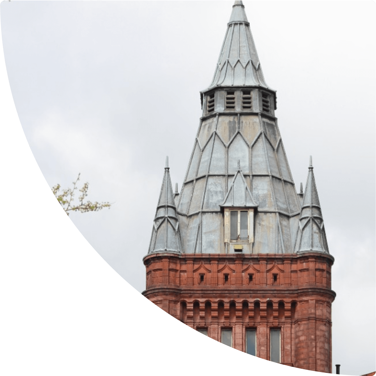 a tower with pointed roof