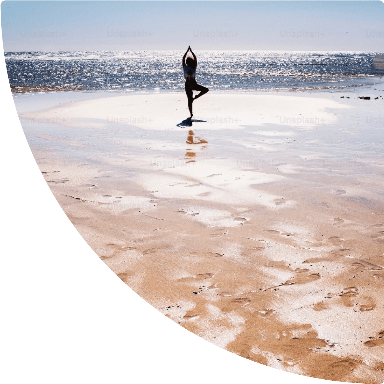 a woman standing on a beach
