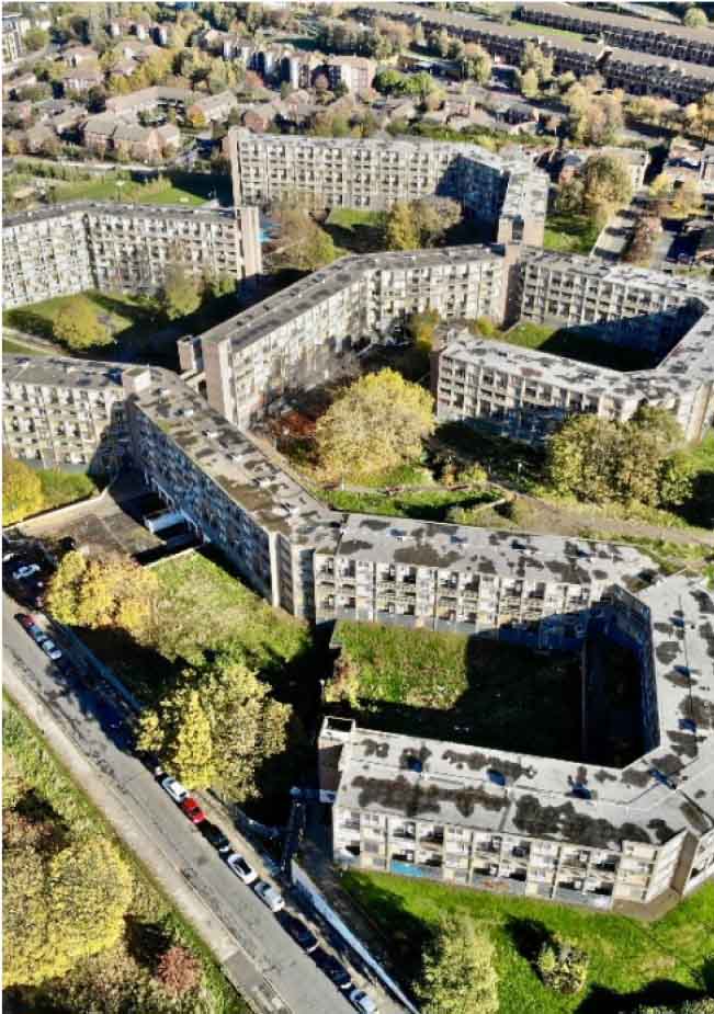 an aerial view of a block of flats