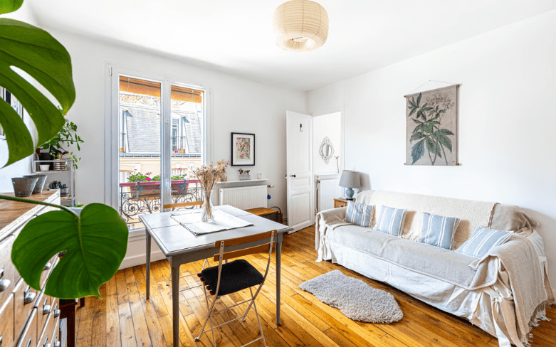 a room with a table and a couch