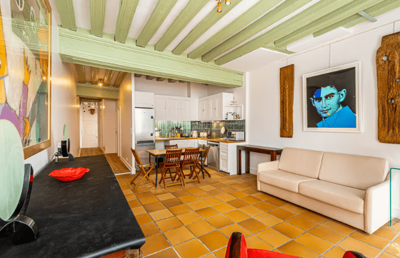 a living room with a couch and a table