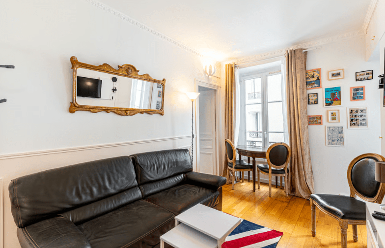 a living room with a couch and table