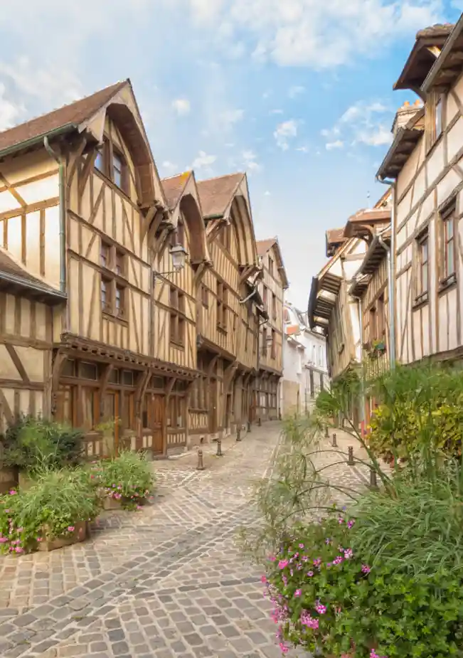 A historic gem in the Grand Est region, Troyes, France, boasts beautifully preserved medieval architecture, winding cobbled streets, and a rich artistic heritage. Discover its iconic half-timbered houses, Gothic churches, and vibrant local markets in the heart of Champagne.