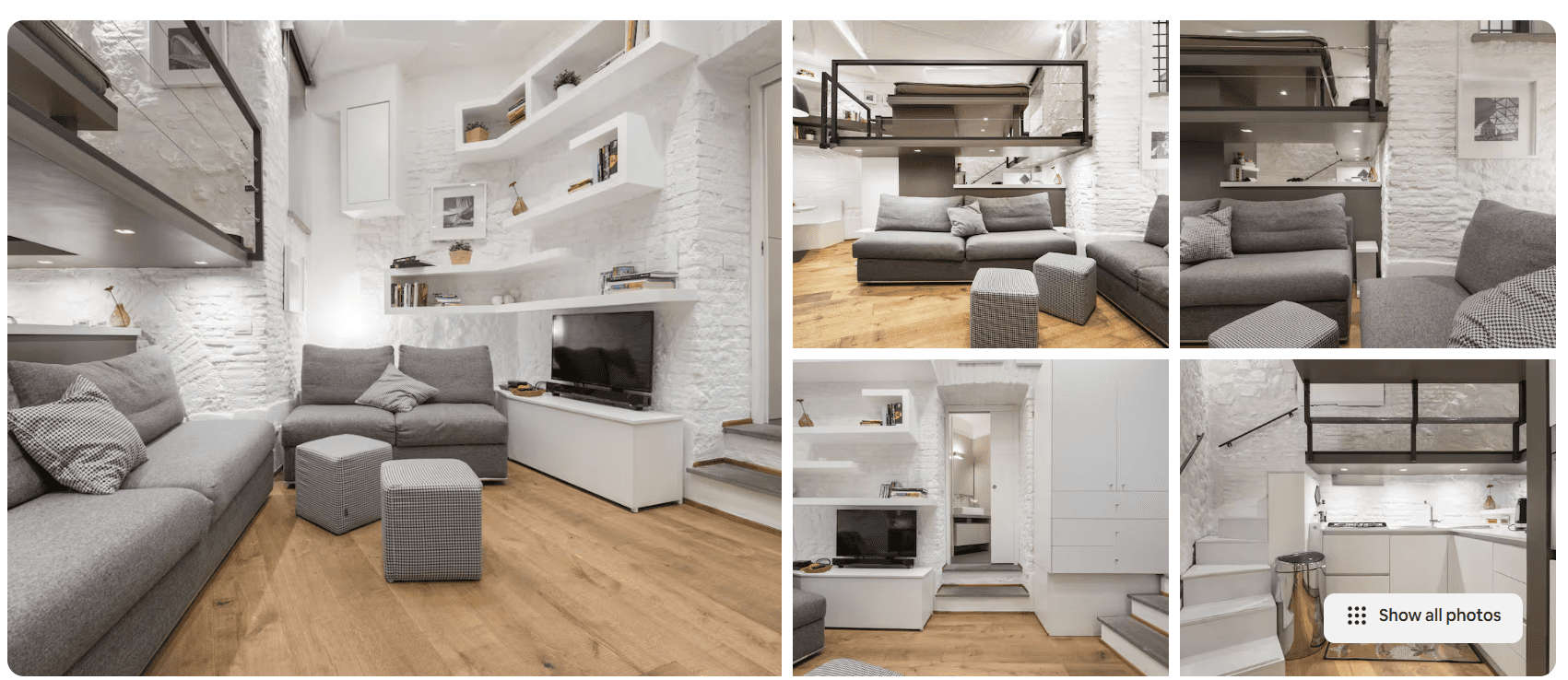 Airbnb description of a compact white loft apartment with exposed brick walls, modern furnishings, a mezzanine bed, and smart use of space.