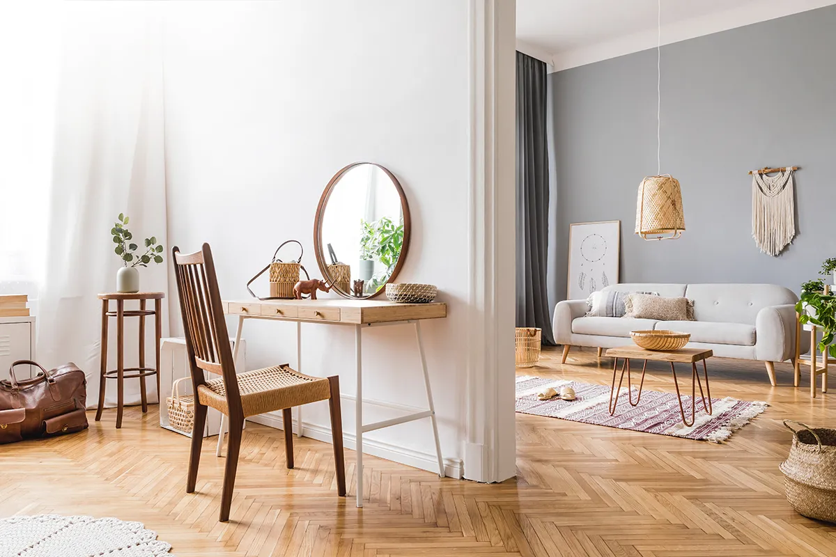 Bright, airy living space with desk and lounge area, soft neutral décor — Airbnb management in Marseille
