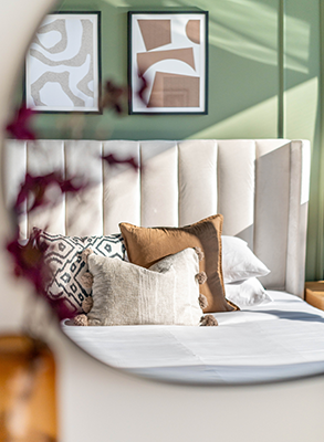 Stylish bedroom in a modern holiday rental - best property management companies